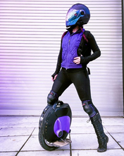 Load image into Gallery viewer, EUC Rider Kelly Chameleon on Instagram, photo used with permission of Kelly Chameleon
